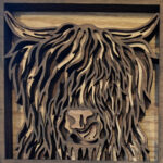 highland cow wood relief