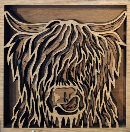 Cow wooden relief